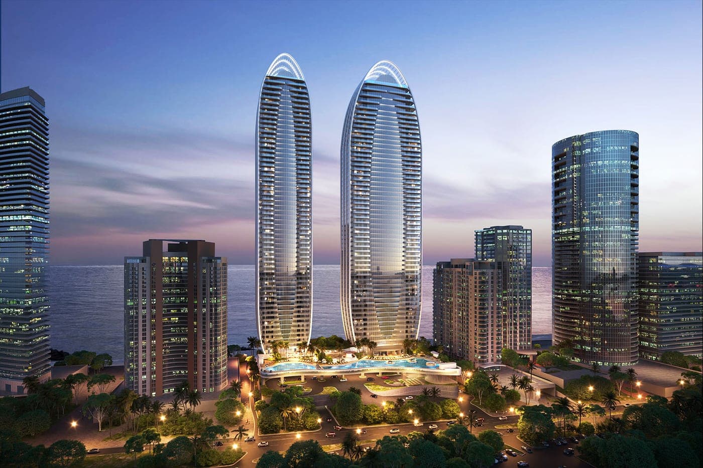 Rendering of the twin St. Regis Residences towers rising over Sunny Isles Beach at dusk